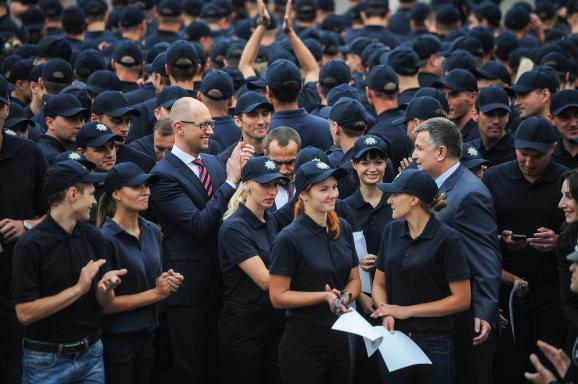 Members of the new Ukrainian police members swear at their oath-swearing ceremony in Kyiv